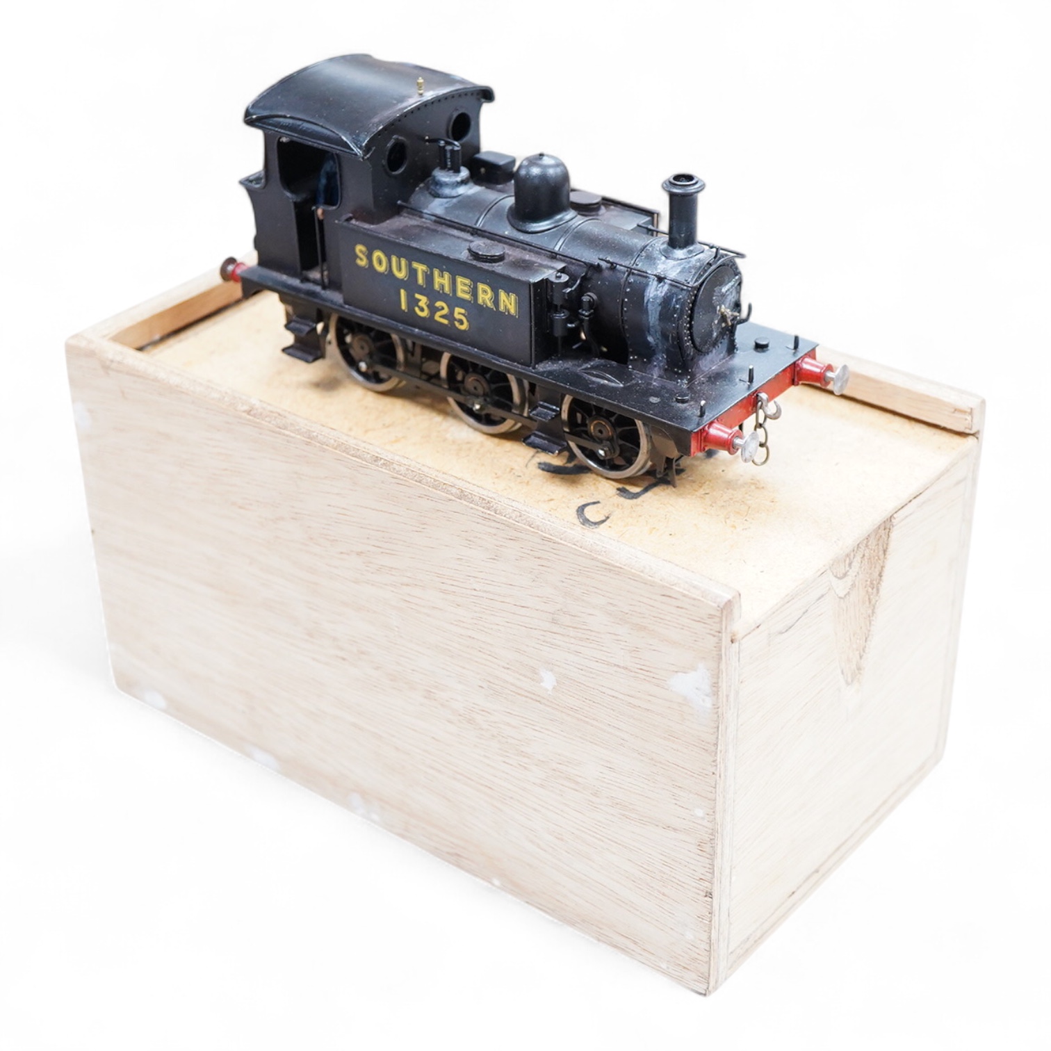 An 0 gauge scratch built model railway locomotive by John Worsley, a Southern Railway P class 0-6-0T, 1325, a detailed model with opening smoke box door showing the details of the blast pipe and boiler tube ends, sprung